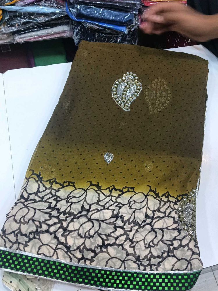 Elegant Brown Embellished Saree