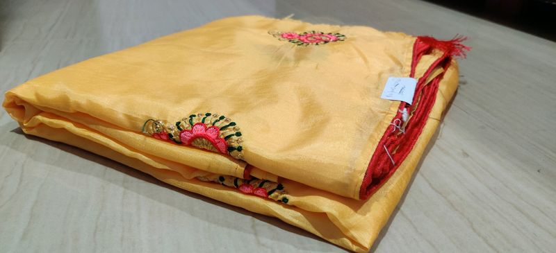 musk melon colour traditional saree with latkans and butas comes with red blouse