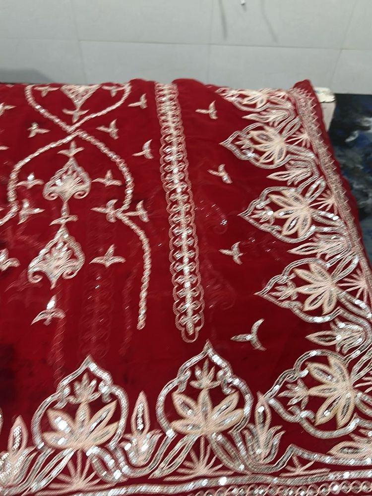 vintage red aari tari work saree