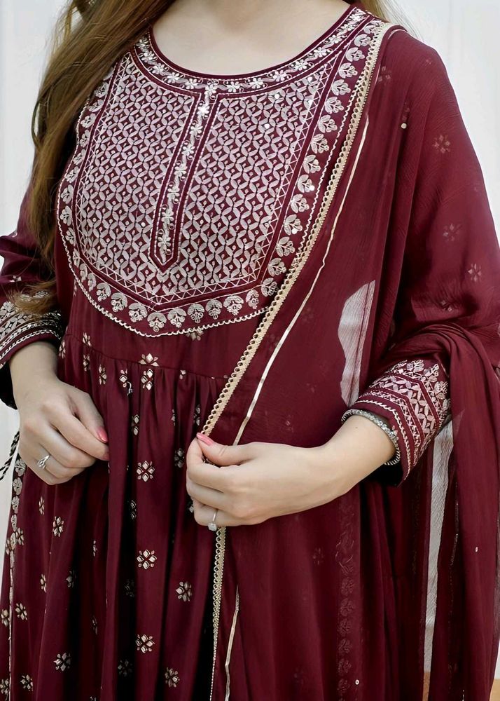 Elegant Maroon Embroidered Nayara Kat.  Suit
