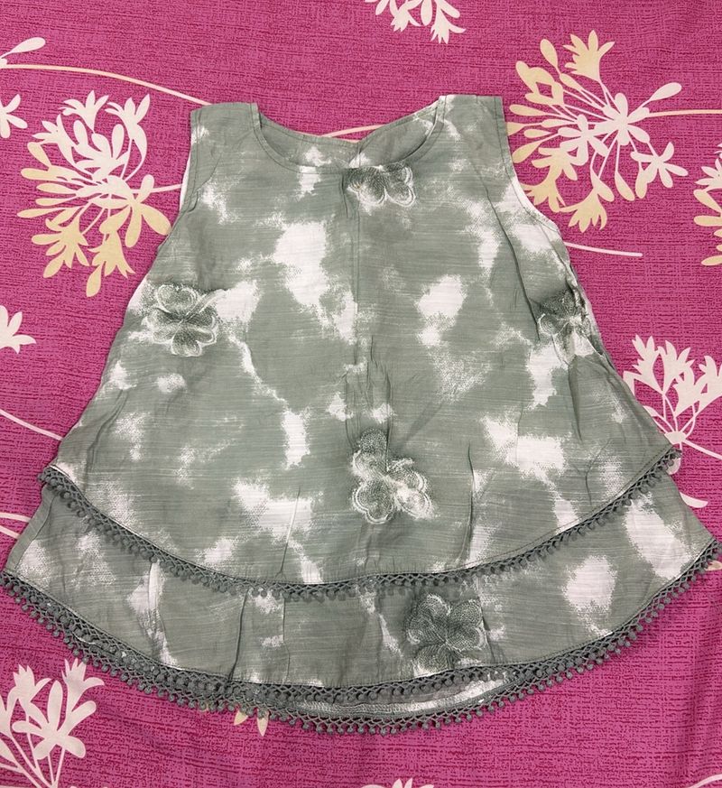 Green Sleeveless Top with Bows &amp; Tassels