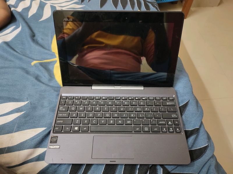 Asus mini windows touch laptop bacome Tab