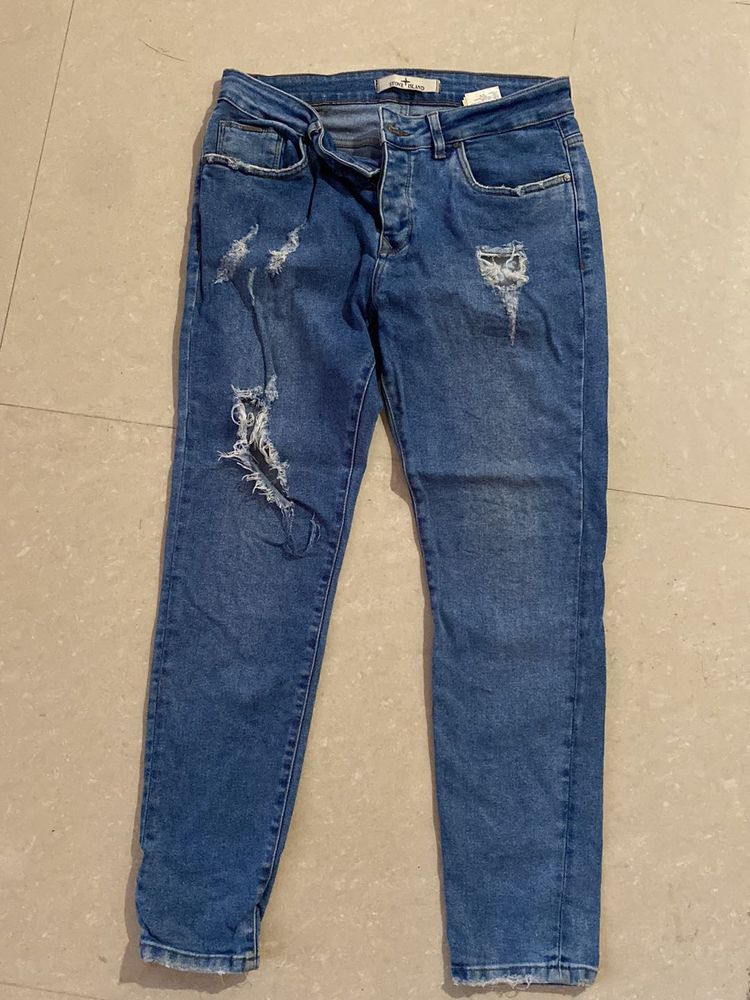 Ripped Blue Denim Jeans