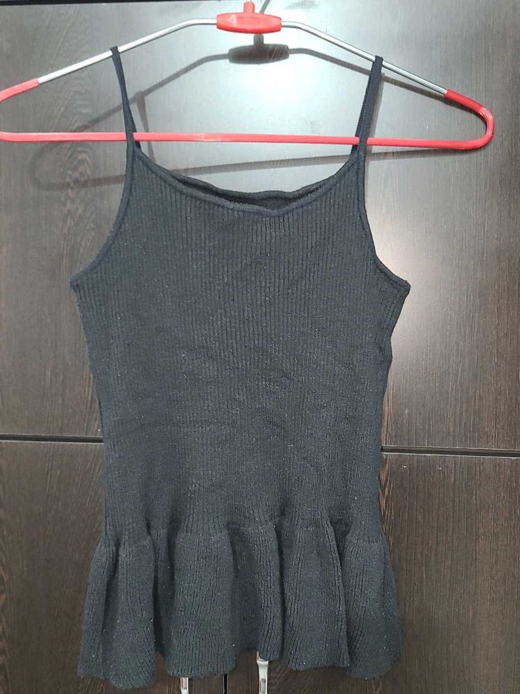 Sleeveless Black Peplum Top