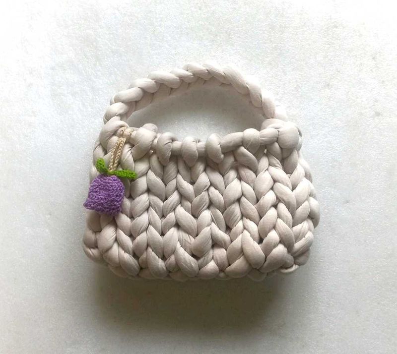 cute handmade crochet bag with charm