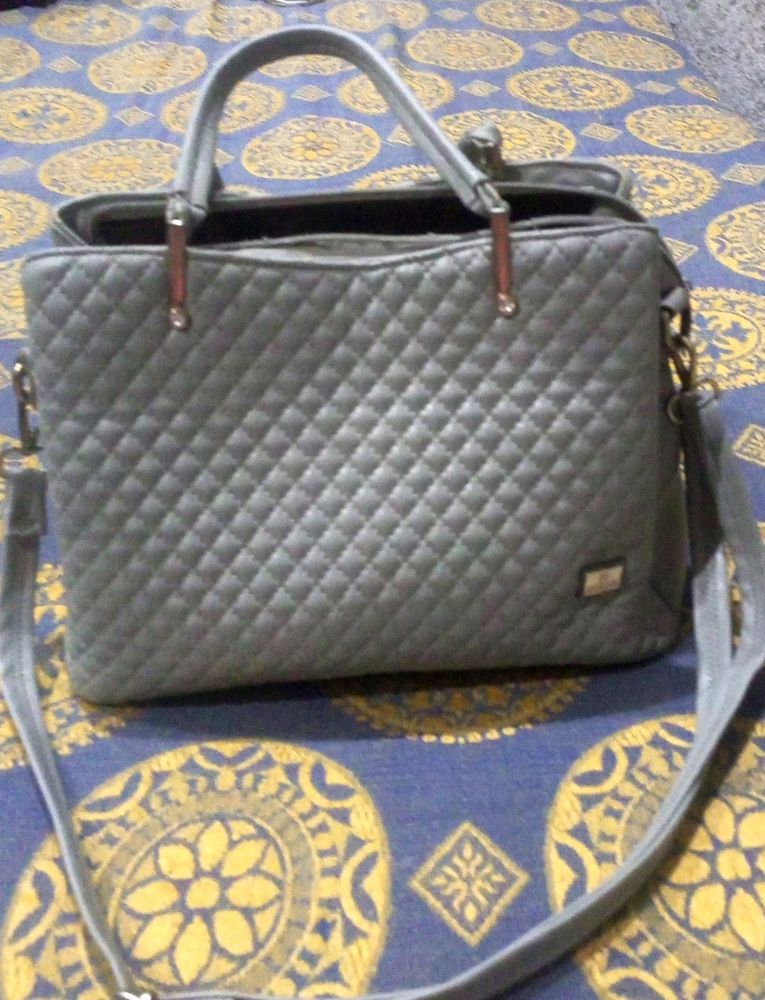 Beautiful Handbag With Extra  Long Strip