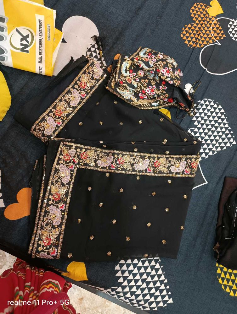 Elegant Black Saree with Embellished Border