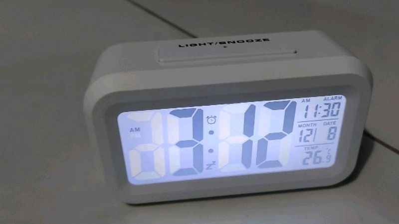 Digital Smart Clock With Alarm And Futuristic