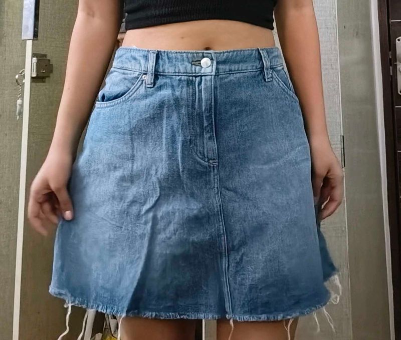 Distressed Denim Mini Skirt