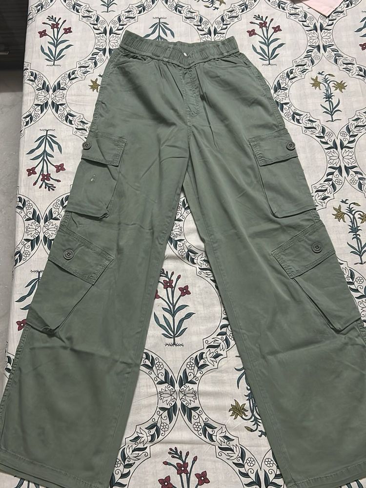 It Is A Olive Green Cargo With Pockets In I