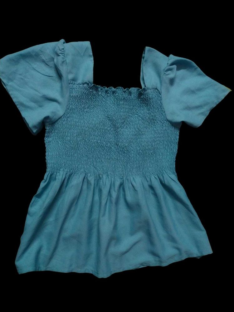Blue Smocked Peplum Top