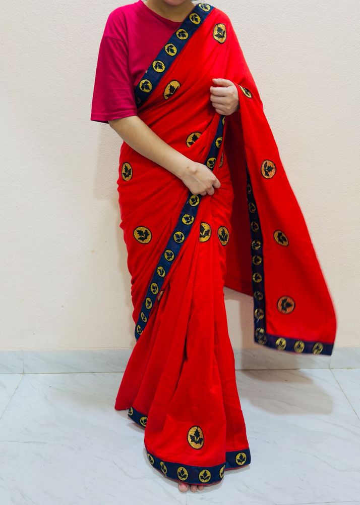 Red Saree With Blue Unstitched Blouse