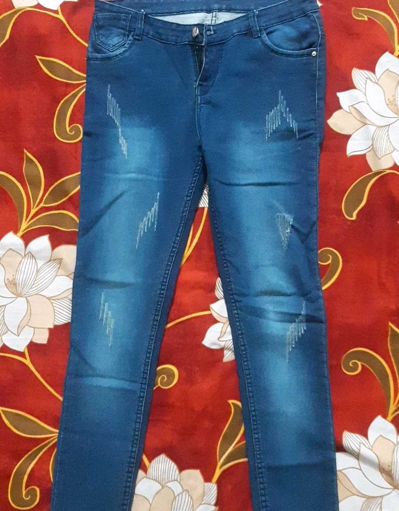 Distressed Denim Jeans