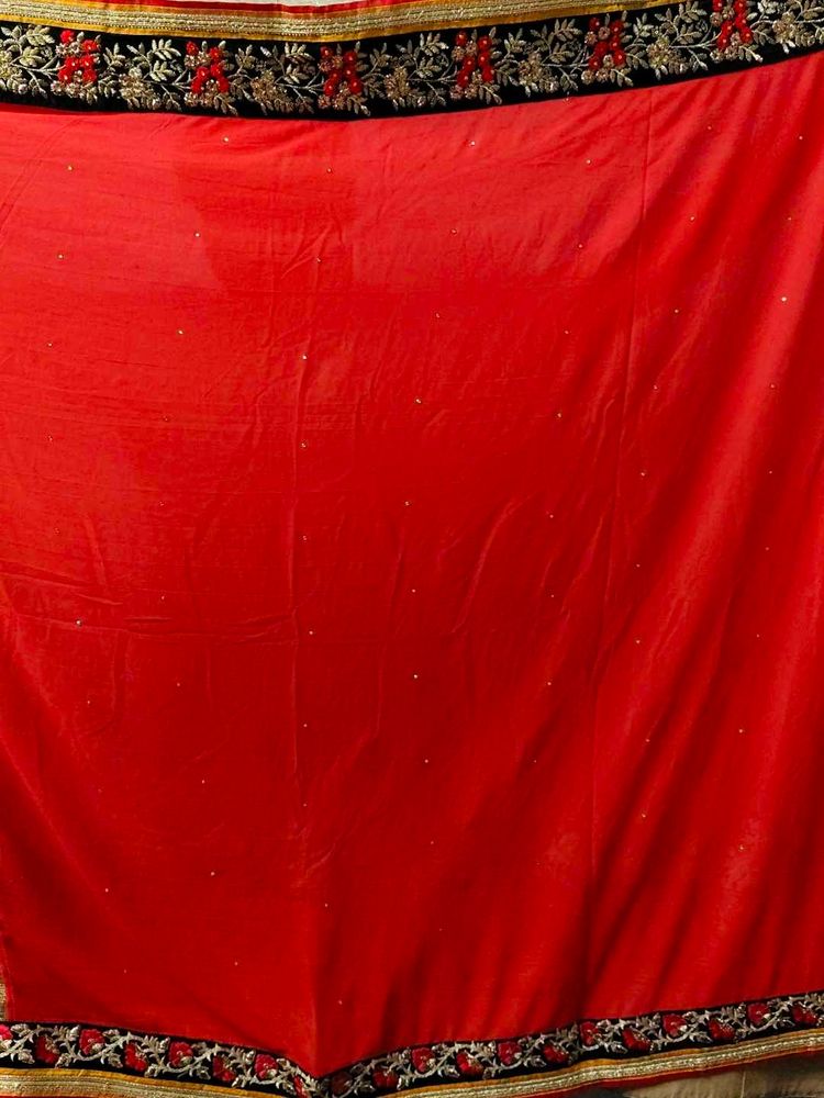 Elegant coral colour saree with blouse