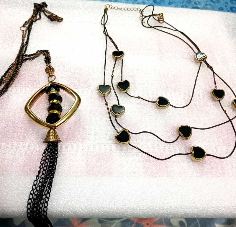 Long Neck Piece And Black Earrings