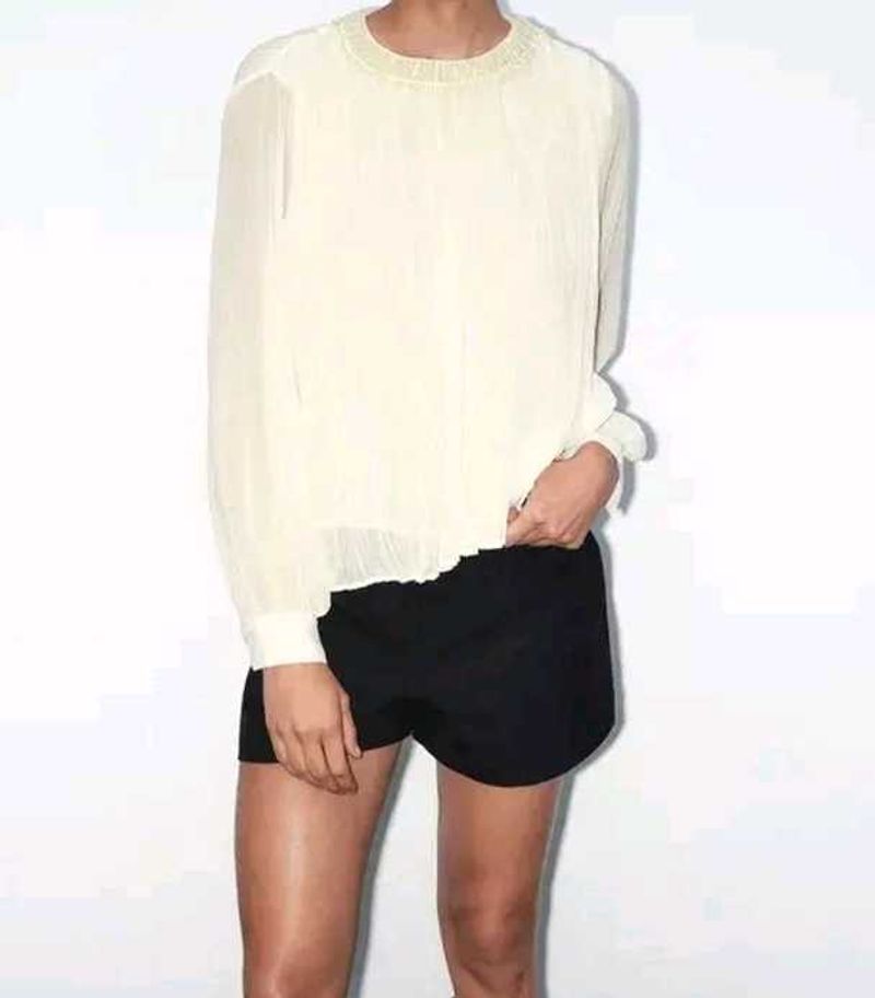 Top With Faux Pearl Detail At The Neck