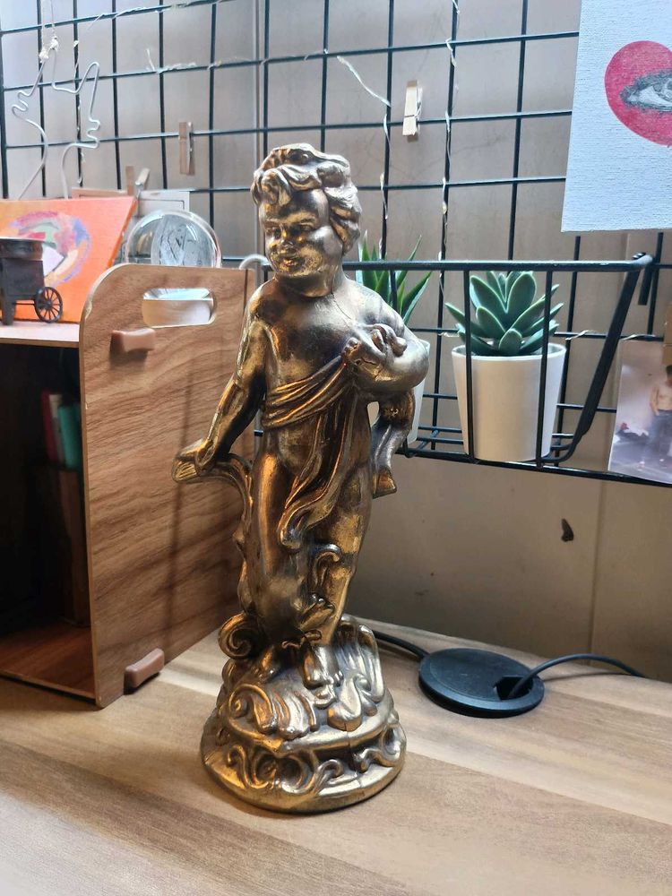 Golden Cherub Statue