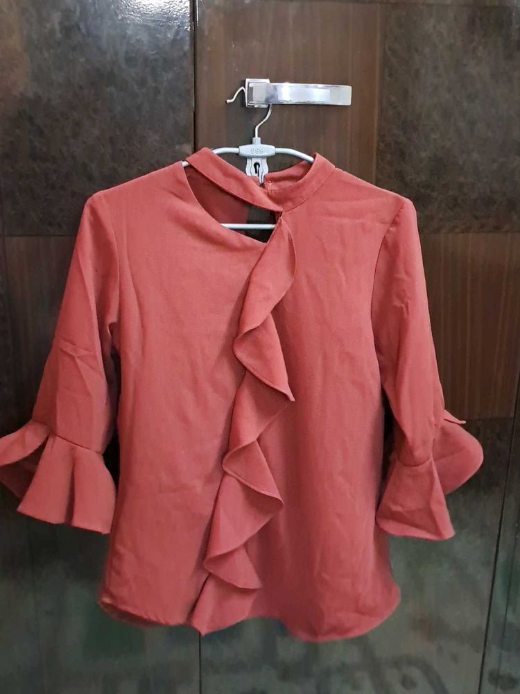 Ruffled Top with Unique Neckline