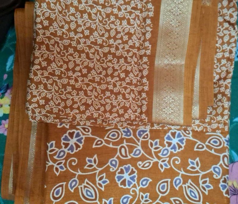 Brown Floral Maheswari Semi Silk Saree .