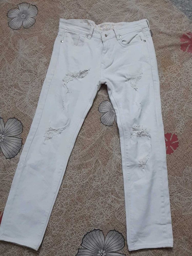 Distressed White Denim Jeans