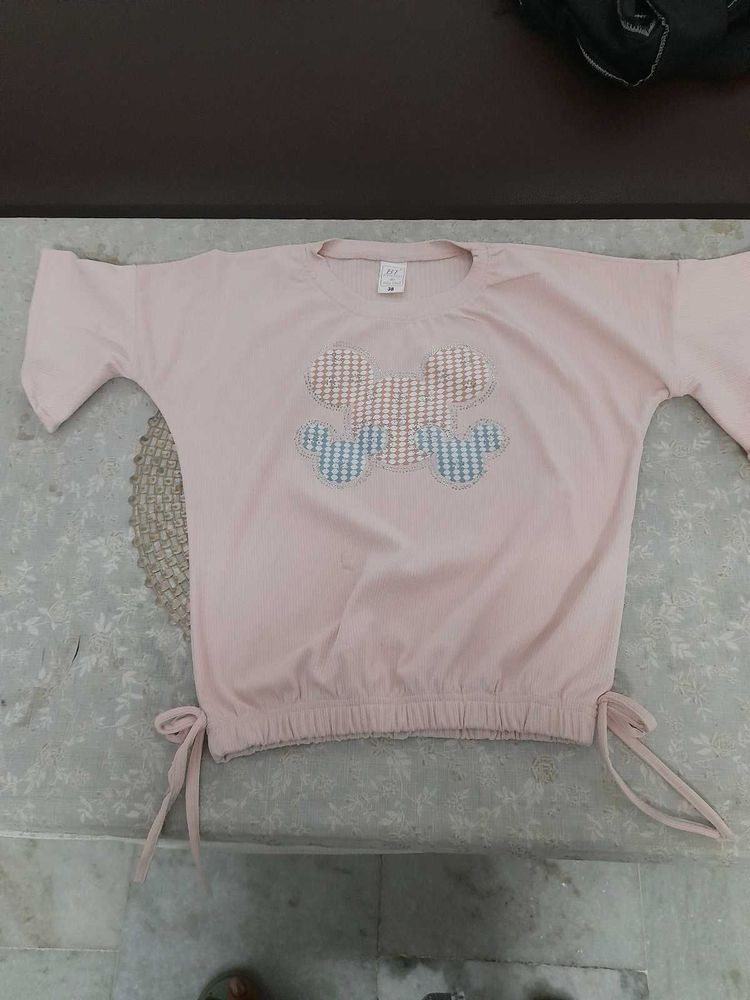 black jeans and like new dark peach top