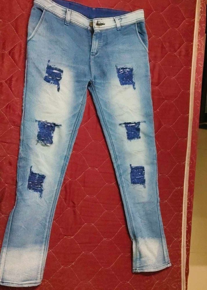 Distressed Denim Jeans