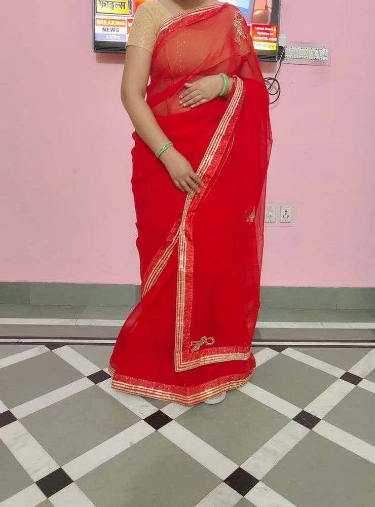 bright red saree with blouse
