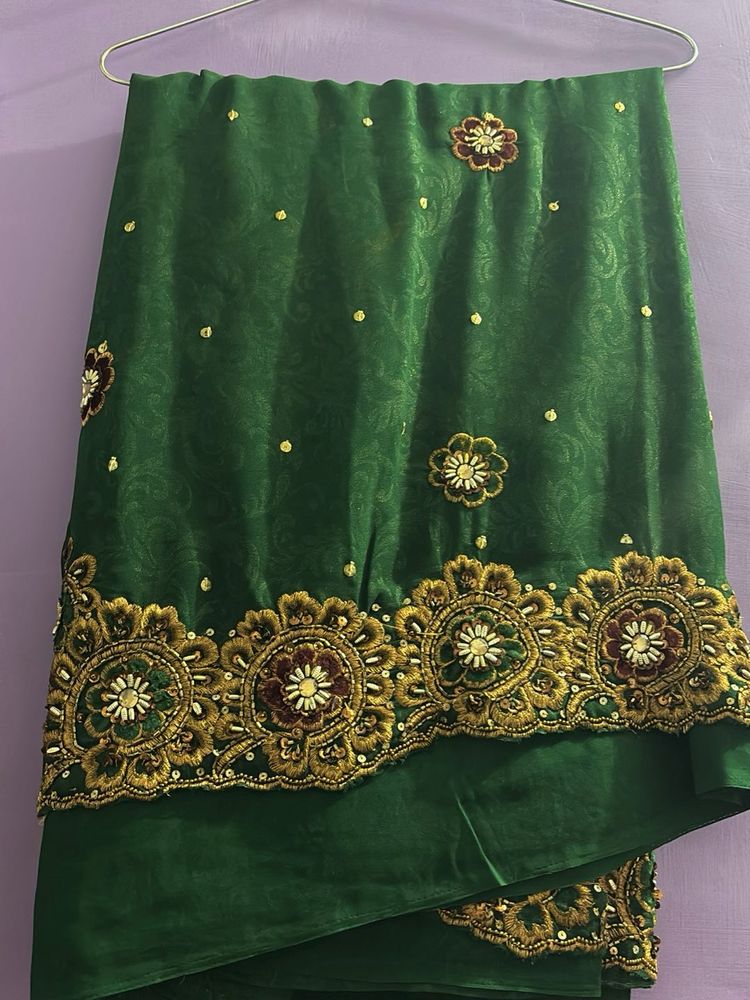 Gorgeous Green Embroidered Saree