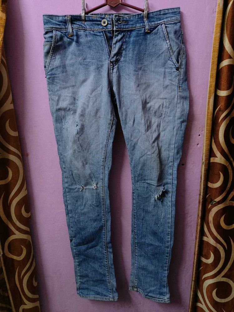 Distressed Denim Jeans