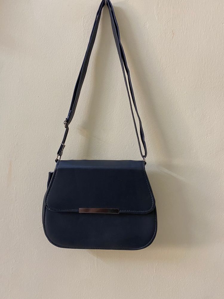 Black Colour Leather Sling And Also Shoulder Bag
