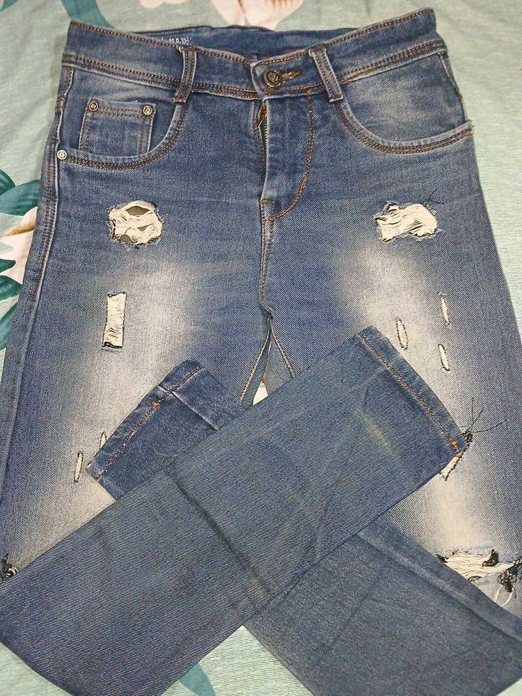 Distressed Denim Jeans