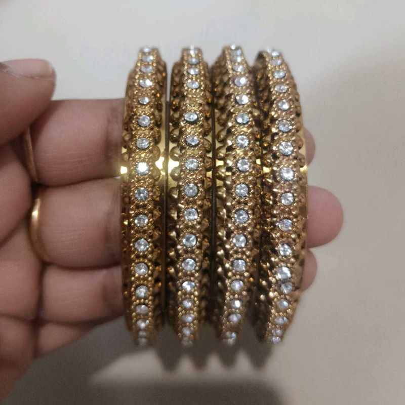 Elegant Gold Tone Bangle Set