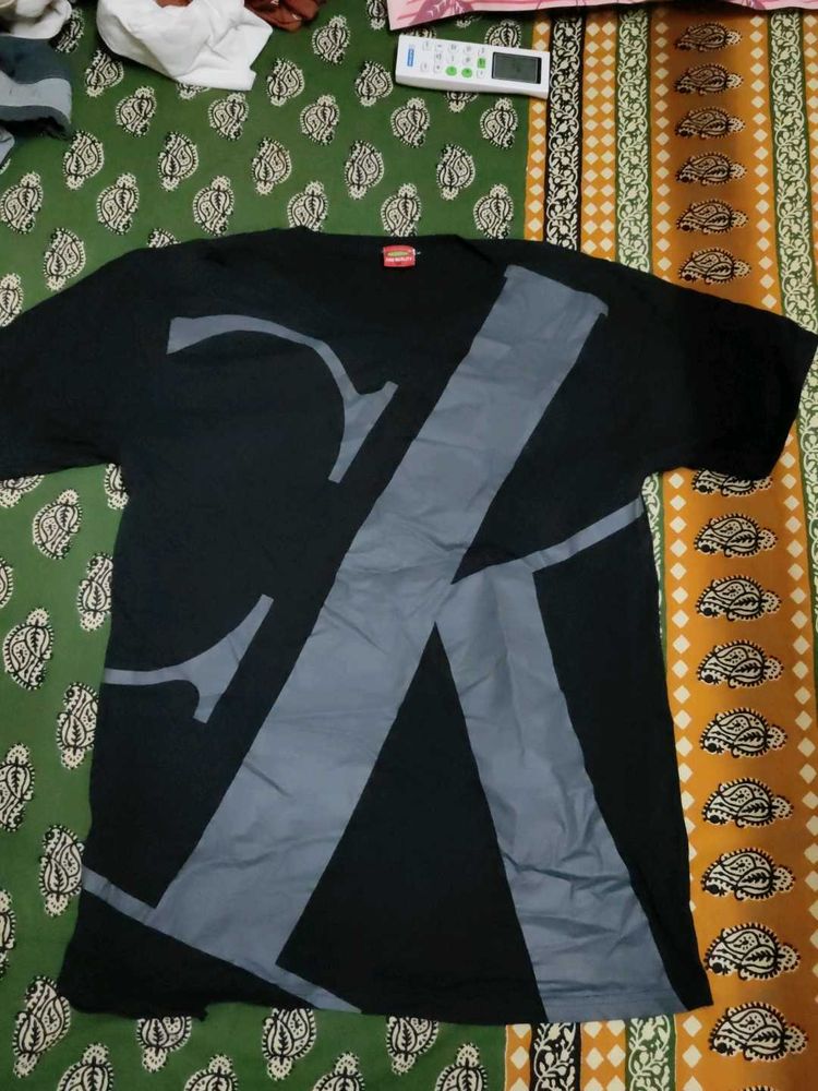 A BLACK T-SHIRT