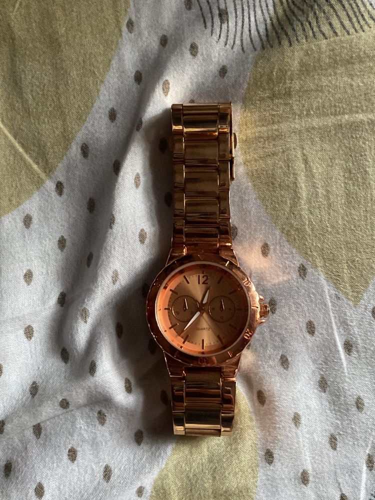 men &amp; women golden watch