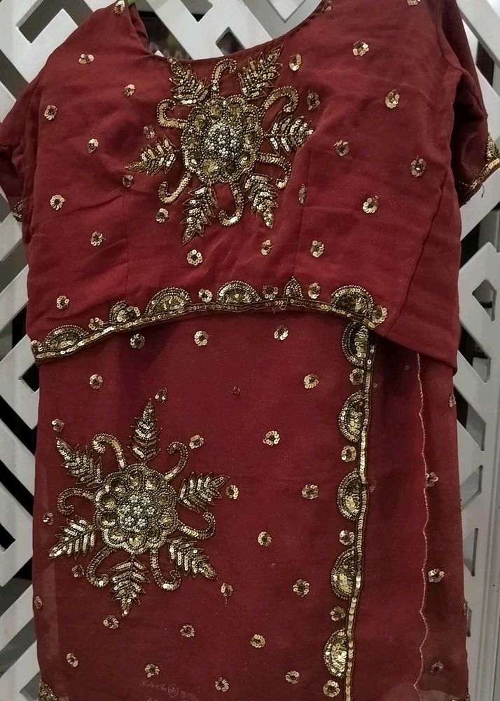 Maroon &amp; Gold Embellished Saree