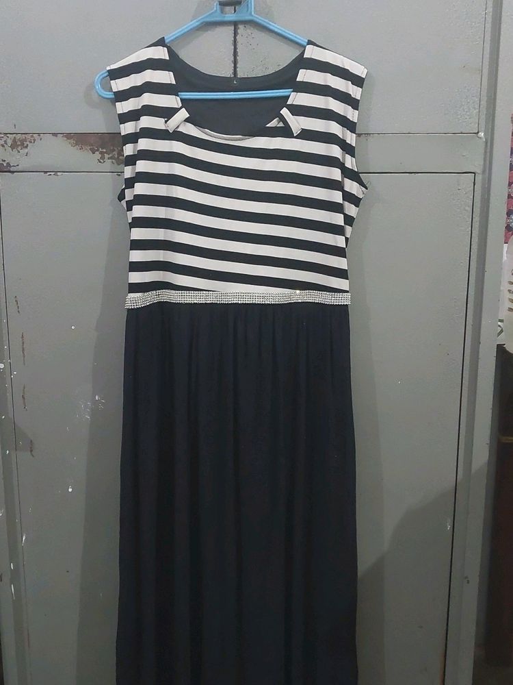 Only wore it a few times. Can wear as long gown or midi