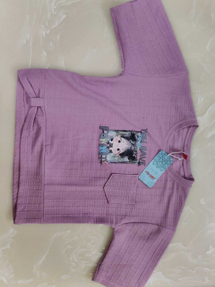 A beautiful purple T-shirt for women and girls.