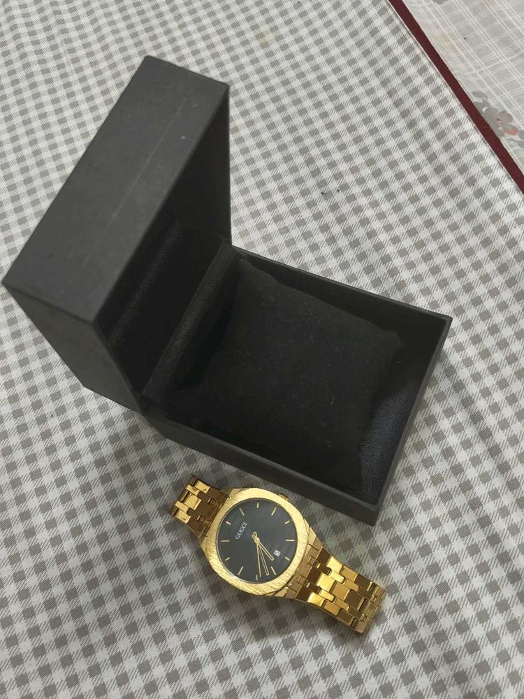 Gucci Gold Watch