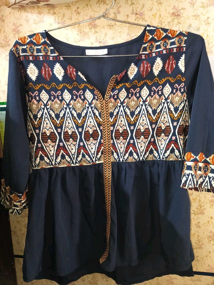 Branded Blue Top.