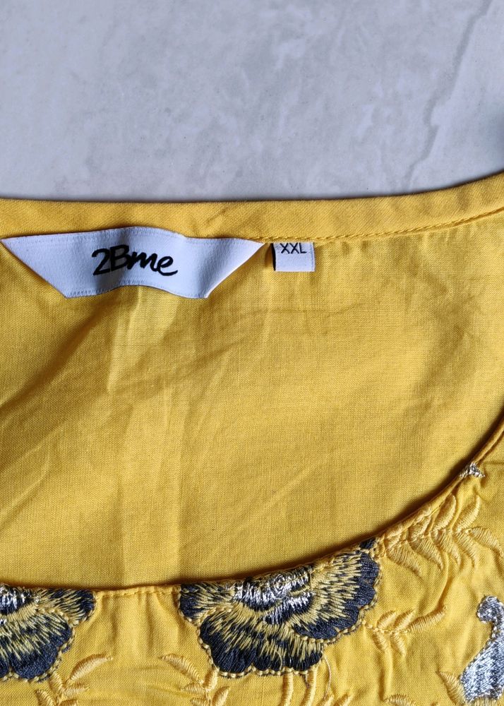 Yellow Embroidered Straight Kurti....