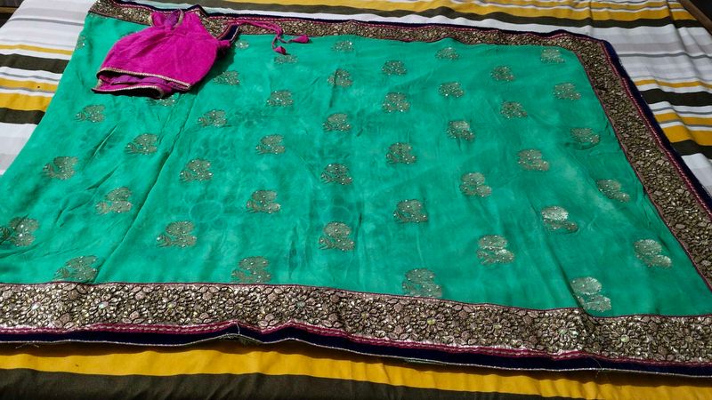 Green Chiffon And Net Sari With Blouse