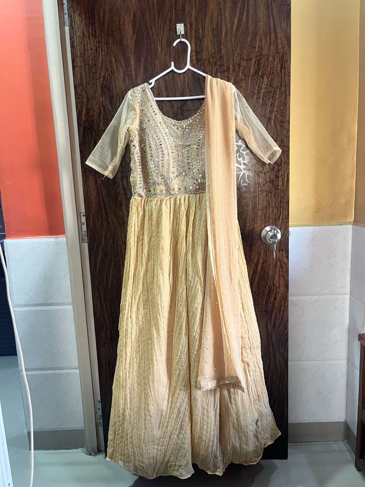 34 bust heavy golden gown with dupatta