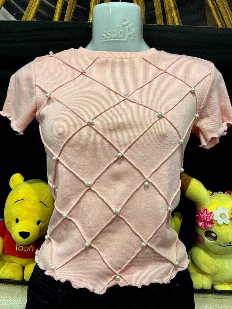 Pearl Lattice Ruffle Knit Top