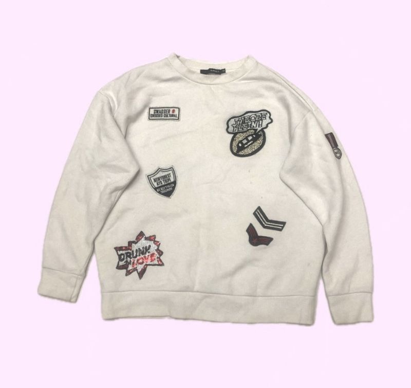 White Sweatshirt With Stickers