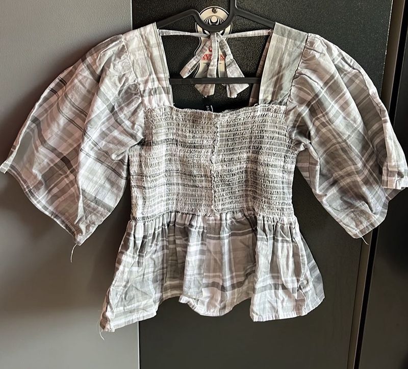 Checkered Peplum Top