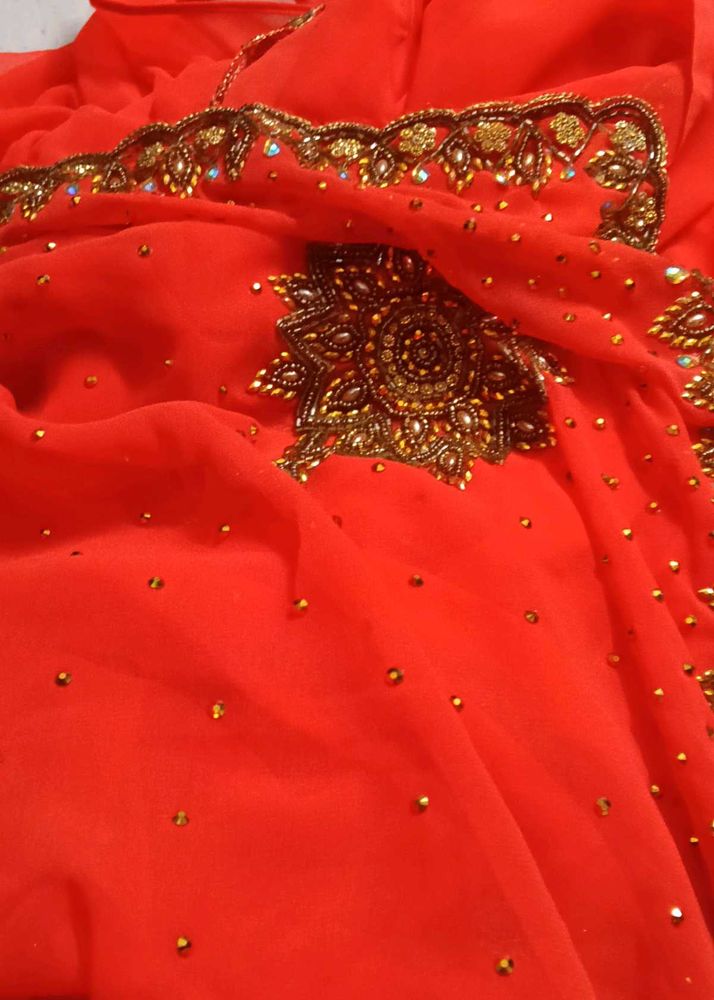 Elegant Orange Embellished Saree
