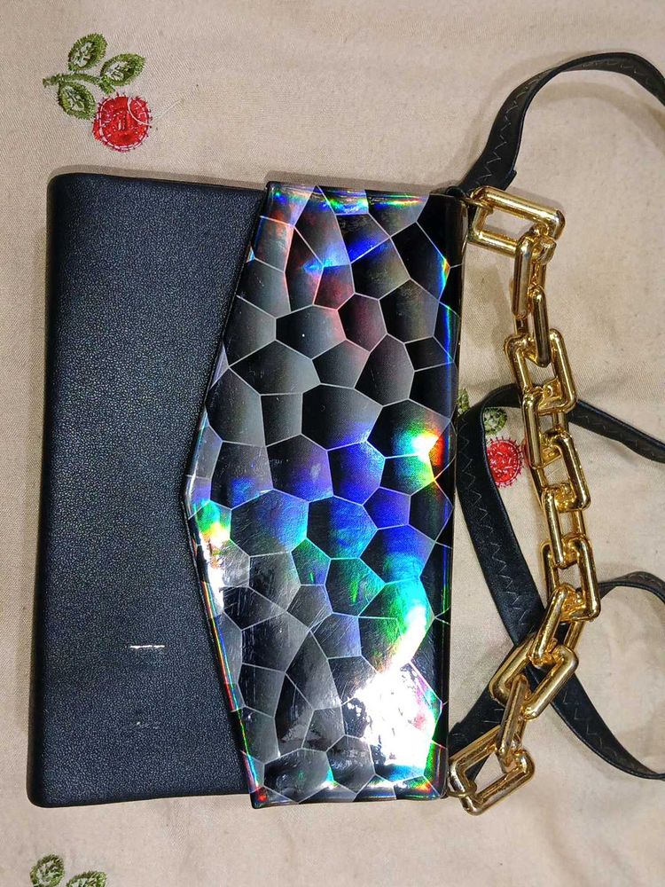 Black Rambo Shine Clutch 👌