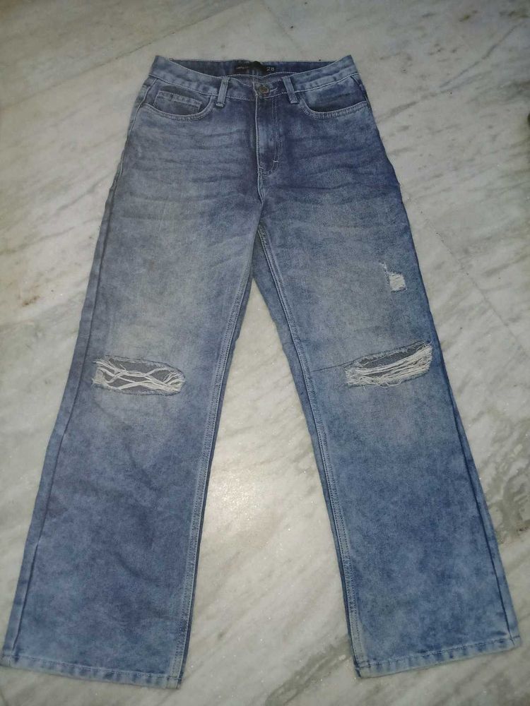 striped halter crop top and blue ripped jeans