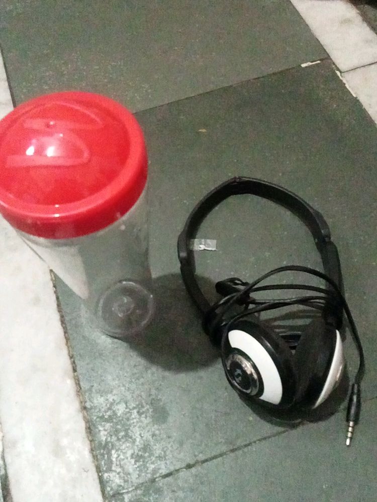 Headphone And McDonal Bottle