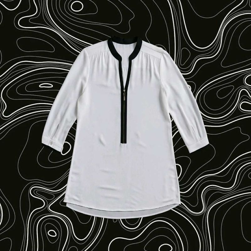 Chic White Blouse with Black Trim